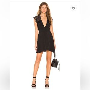 Free People black mini dress size small. Brand new.
